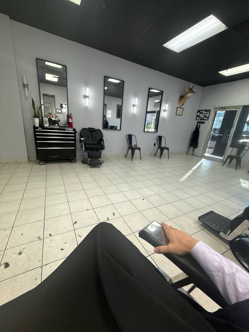 Open barber station at Cut and Shave